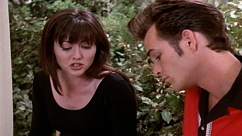 Shannen Doherty playing  Brenda Walsh in Beverly Hills, 90210
