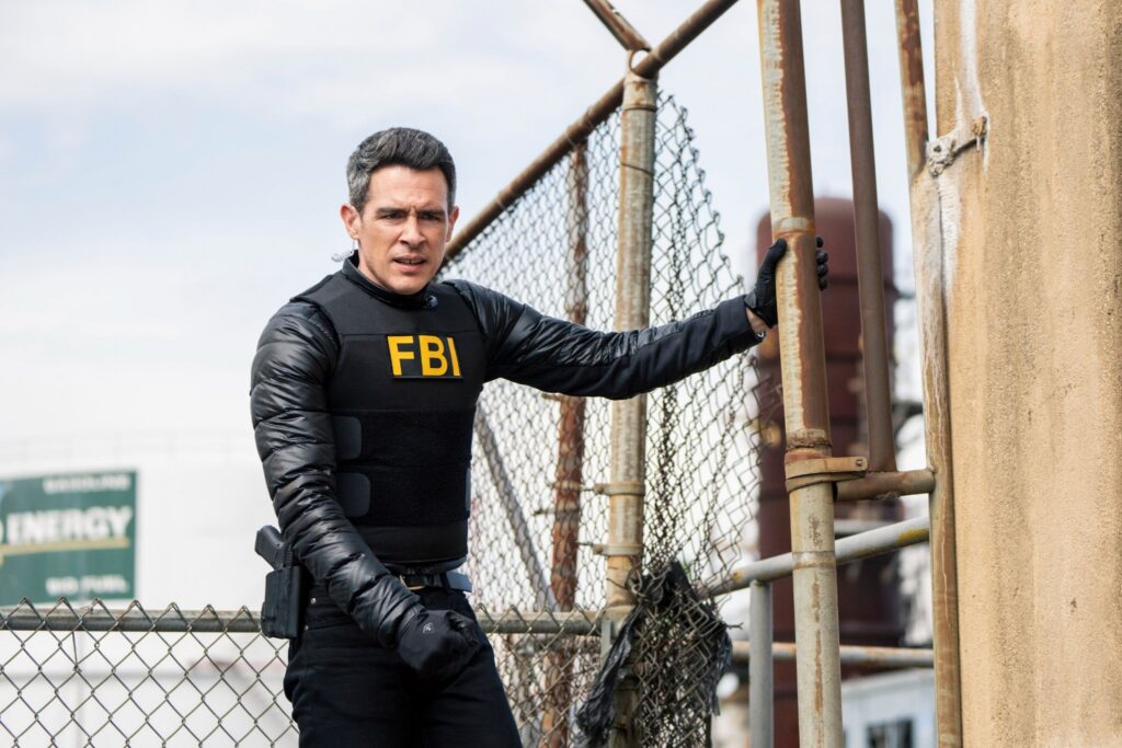 John Boyd as Stuart Scola in FBI