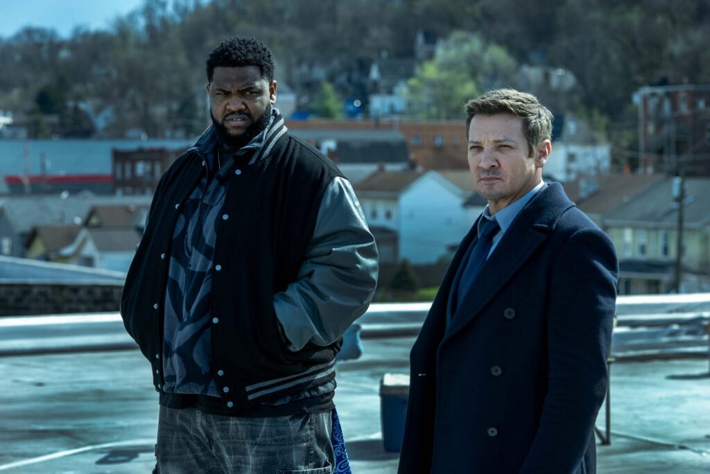 L-R: Tobi Bamtefa as Deverin "Bunny" Washington and Jeremy Renner as Mike McLusky in Mayor of Kingstown season 5, streaming on Paramount+, 2027. Credit: Jeremy Parsons/Paramount+