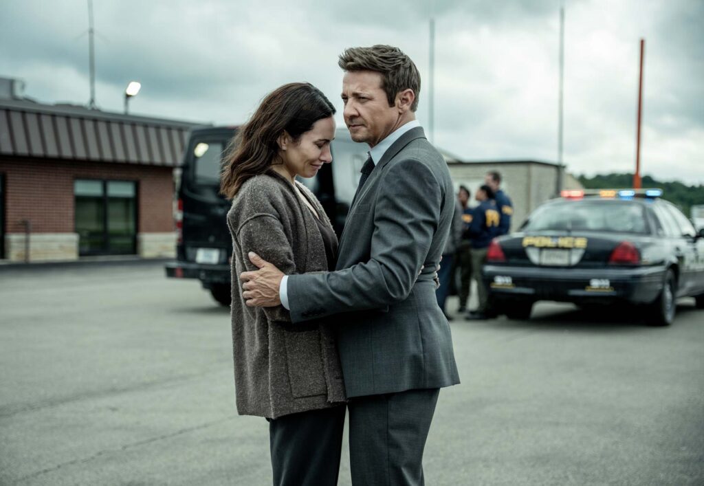L-R:Laura Benanti as Cindy Stephens and Jeremy Renner as Mike McLusky in Mayor of Kingstown season 5, streaming on Paramount+, 2027. Credit: Jeremy Parsons/Paramount+